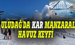Bursa Uludağ'da kar manzaralı havuz keyfi