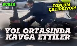 Toplum çatırdıyor, Bursa'da yol ortasında kavga ettiler!