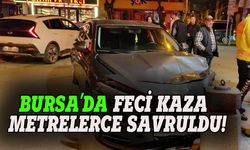 Bursa'da otomobile çarpan motosiklet metrelerce savruldu