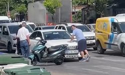 Maganda otomobilin kaputuna çıktı, camını kırdı