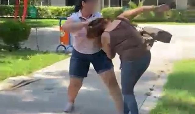 Öfkeli eş kocasıyla parkta bastı, kadına meydan dayağı attı